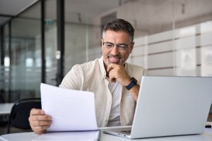 Man applying for a loan at a desk