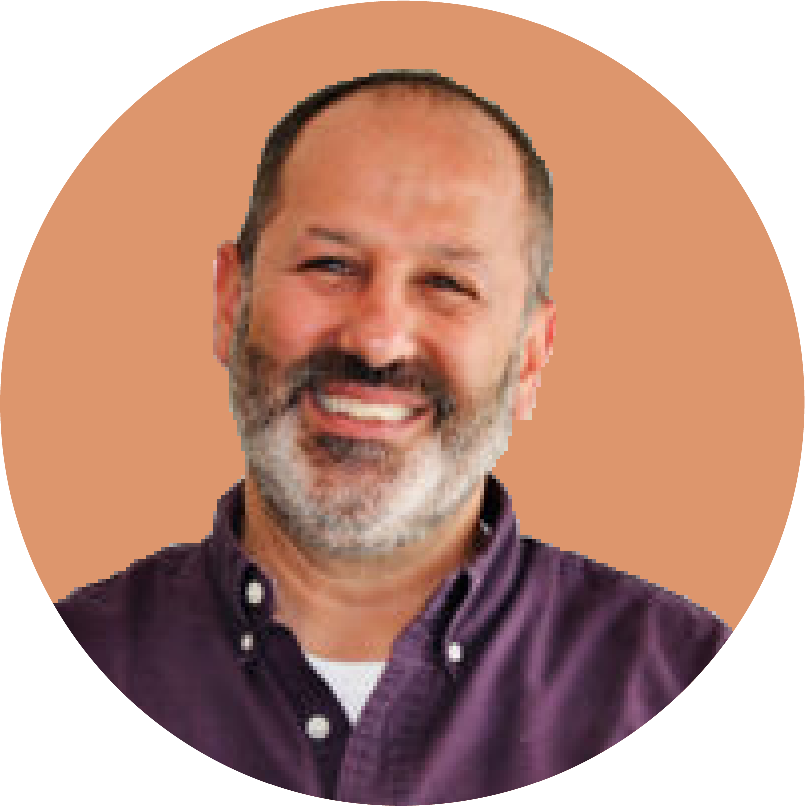 Credibly management team member smiling, professional portrait.