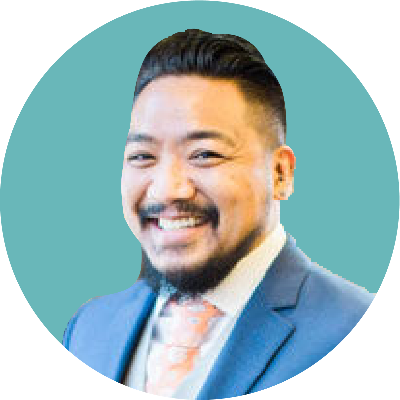 Credibly management team member smiling in professional attire.